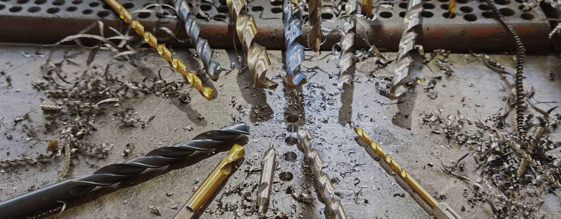 Black oxide drill bit worn out from drilling stainless steel