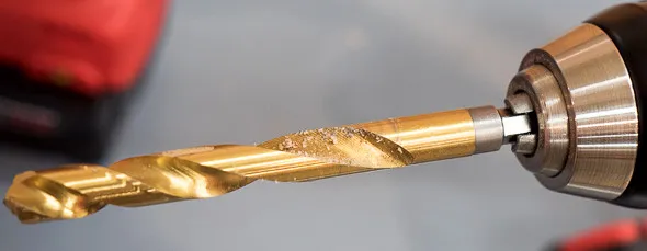 Titanium coating worn off tip of drill bit