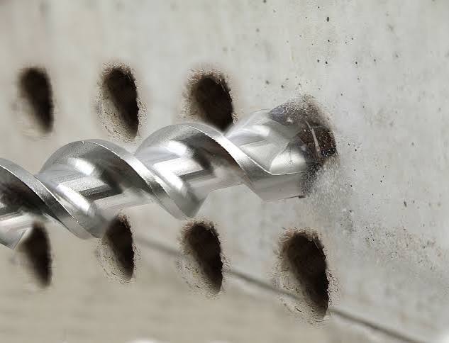 Drilling successive concrete holes: evaluate sustained progress and finished-hole dimensions.