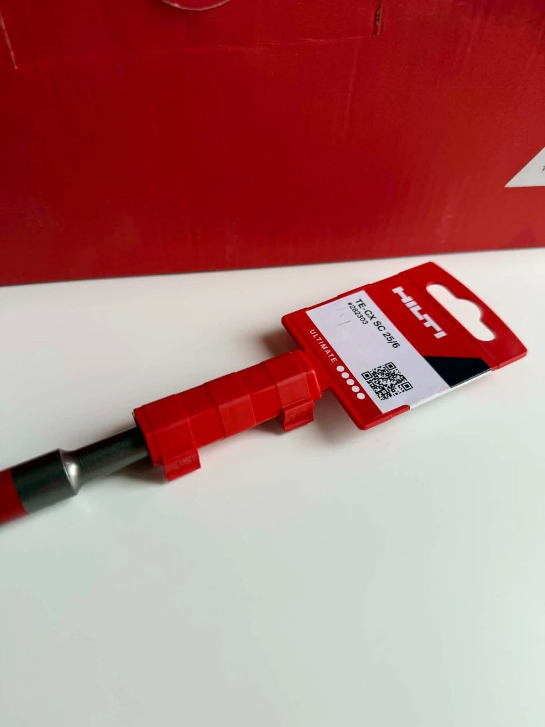 Seitenansicht des Etiketts TE-CX SC 25/6 und des verpackten Einsteckendes.