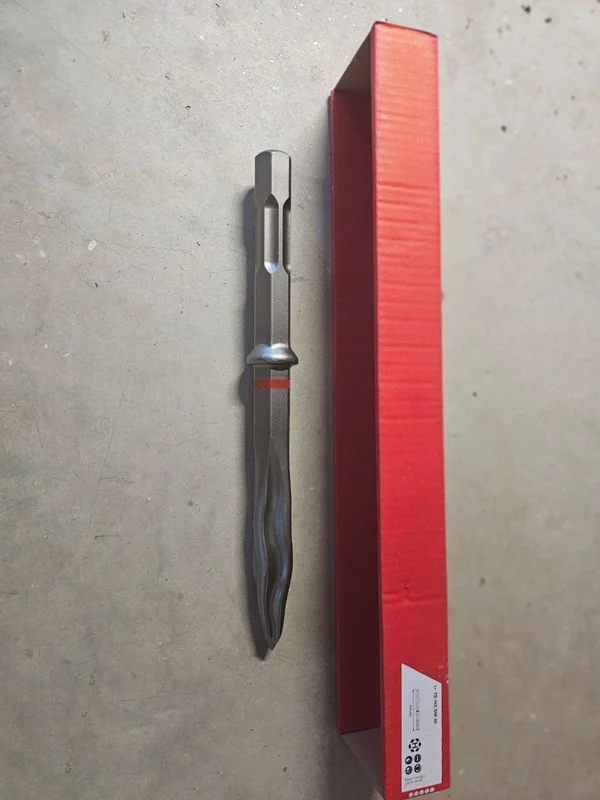 TE-HX SM 40 in voller Länge neben dem Karton mit Spitze, Körper und HEX-28-Einsteckende.
