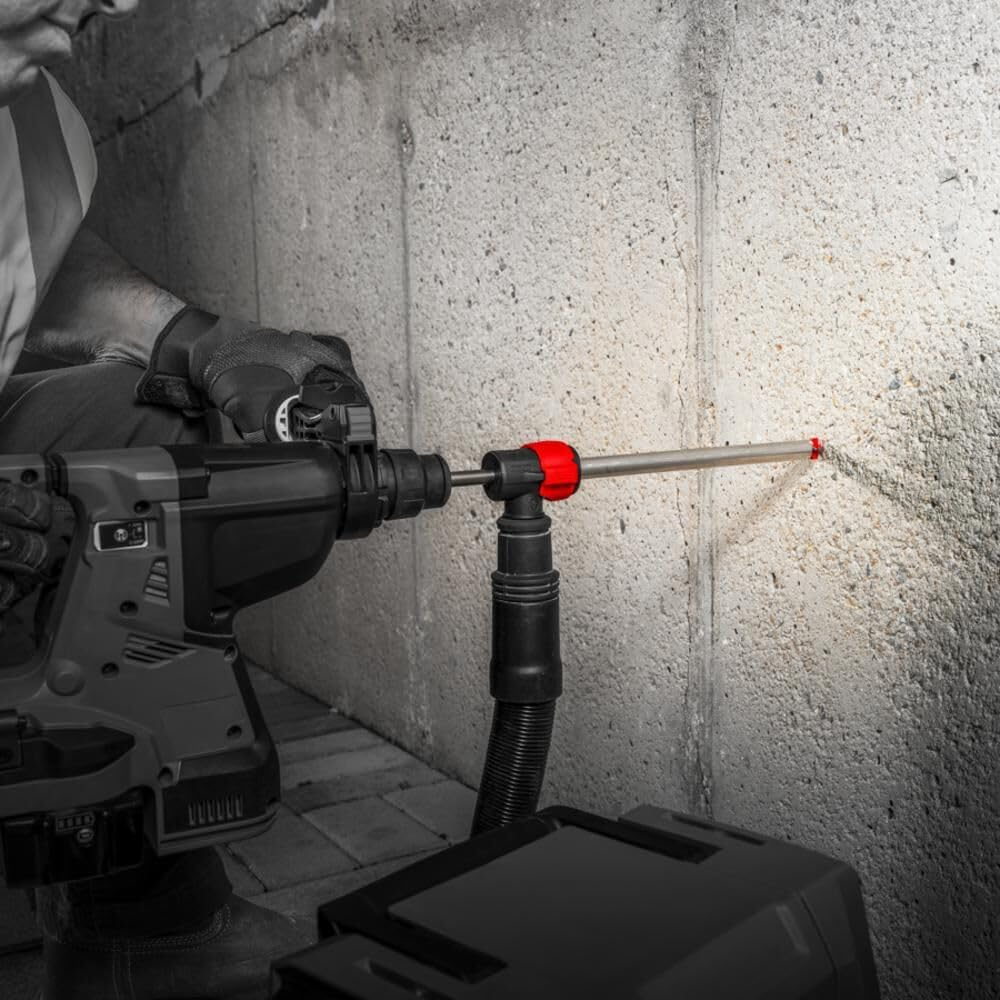 Diablo reference image: drilling with the dust sleeve, adapter and extractor hose connected.